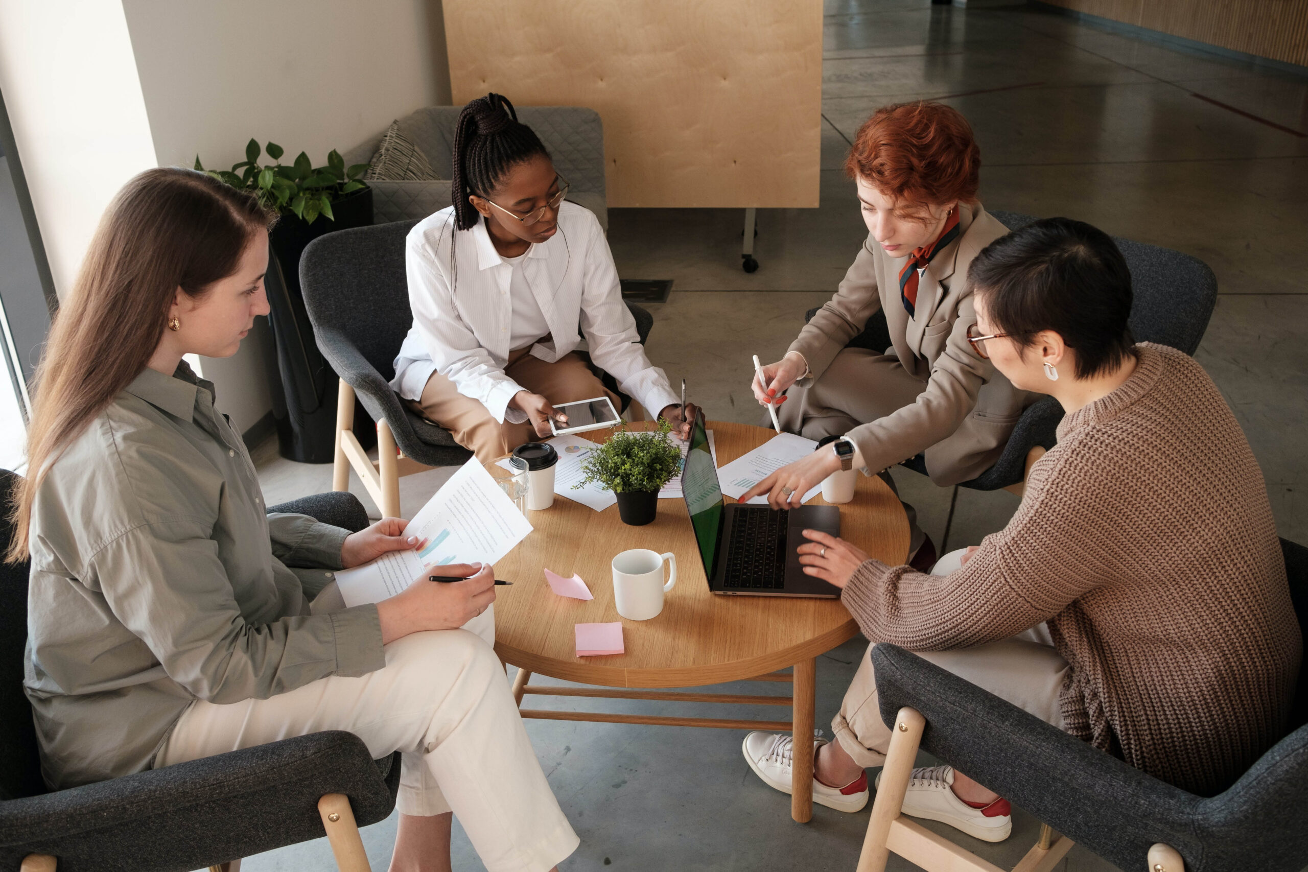 Young Graduate Workers Having Meeting